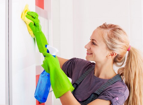 Professional upholstery cleaning on a fabric sofa