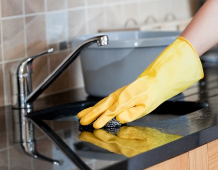 Deep cleaning tools and supplies on a clean surface