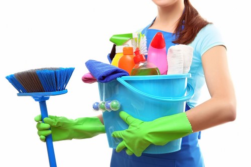House cleaning checklist and supplies arranged neatly