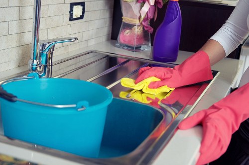 Domestic cleaning service preparing a bright family home